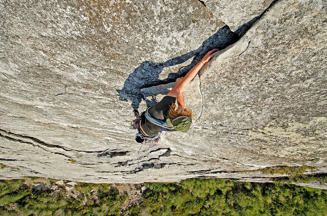 Nic Houser rock climbing a route called Bears Reach which is rated 5,7 and located at Lovers Leap near Lake Tahoe in northern California