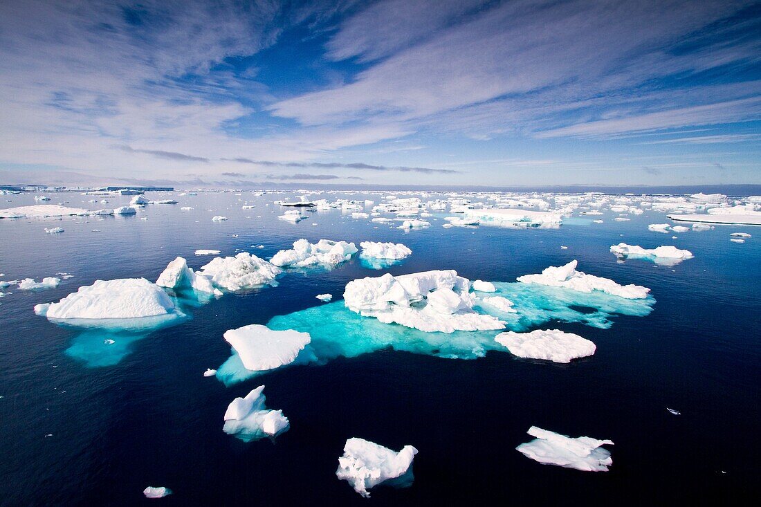Icebergs and sea ice in the Weddell Sea on the eastern side of the Antarctic Peninsula during the summer months, Southern Ocean. Icebergs and sea ice in the Weddell Sea on the eastern side of the Antarctic Peninsula during the summer months, Southern Ocea