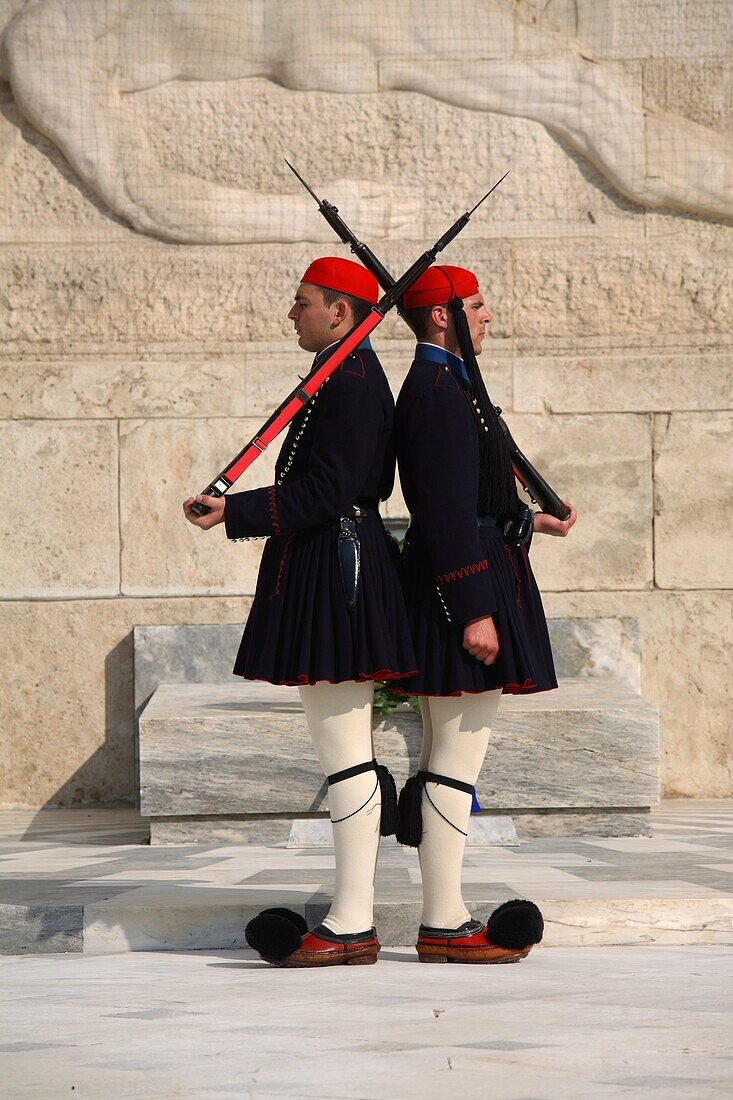 Guards known as evzones marching in front of the tomb of the unknow soldier, Athens, Greece