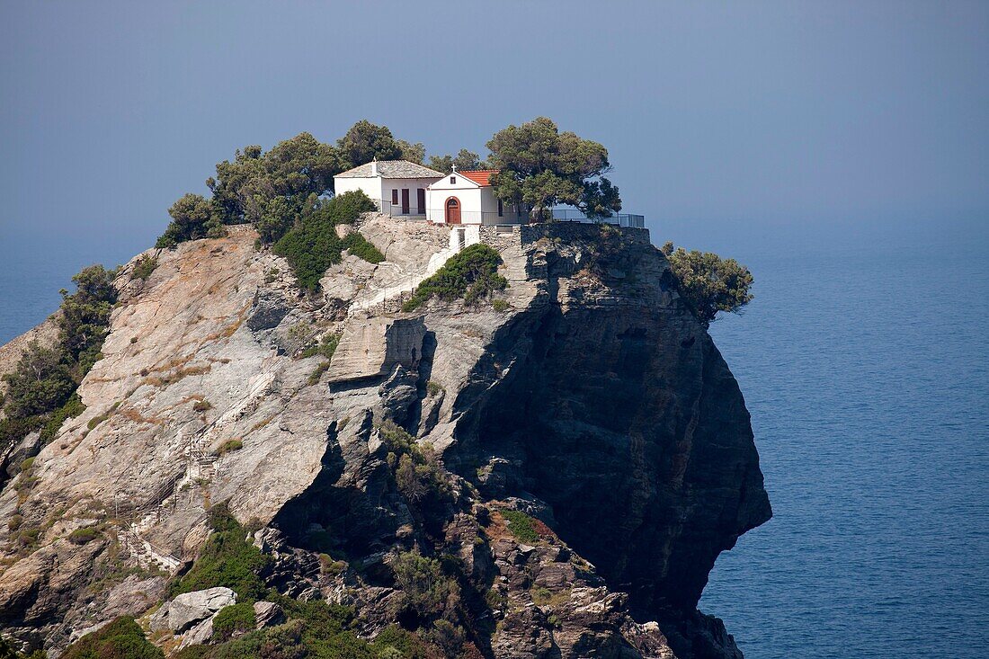 the steep and mountainous northern coast of Skopelos Island with the church Agips Ioannis sto Kastri, famous through the hollywood movie Mamma Mia, Skopelos Island, Northern Sporades, Greece      , Northern Sporades, Greece
