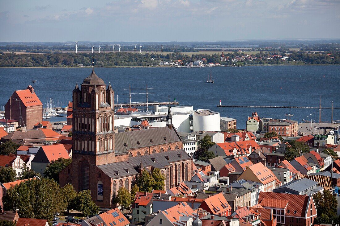 view over the historic centre of Stralsund with Saint James´s Church, Ozeaneum and Ruegen island, Hanseatic City of Stralsund, Mecklenburg-Vorpommern, Germany