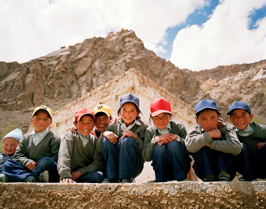 School kids in front of their school, near the convent Thagchokling in village Ney, west of Leh, Ladakh, Jammu and Kashmir, India