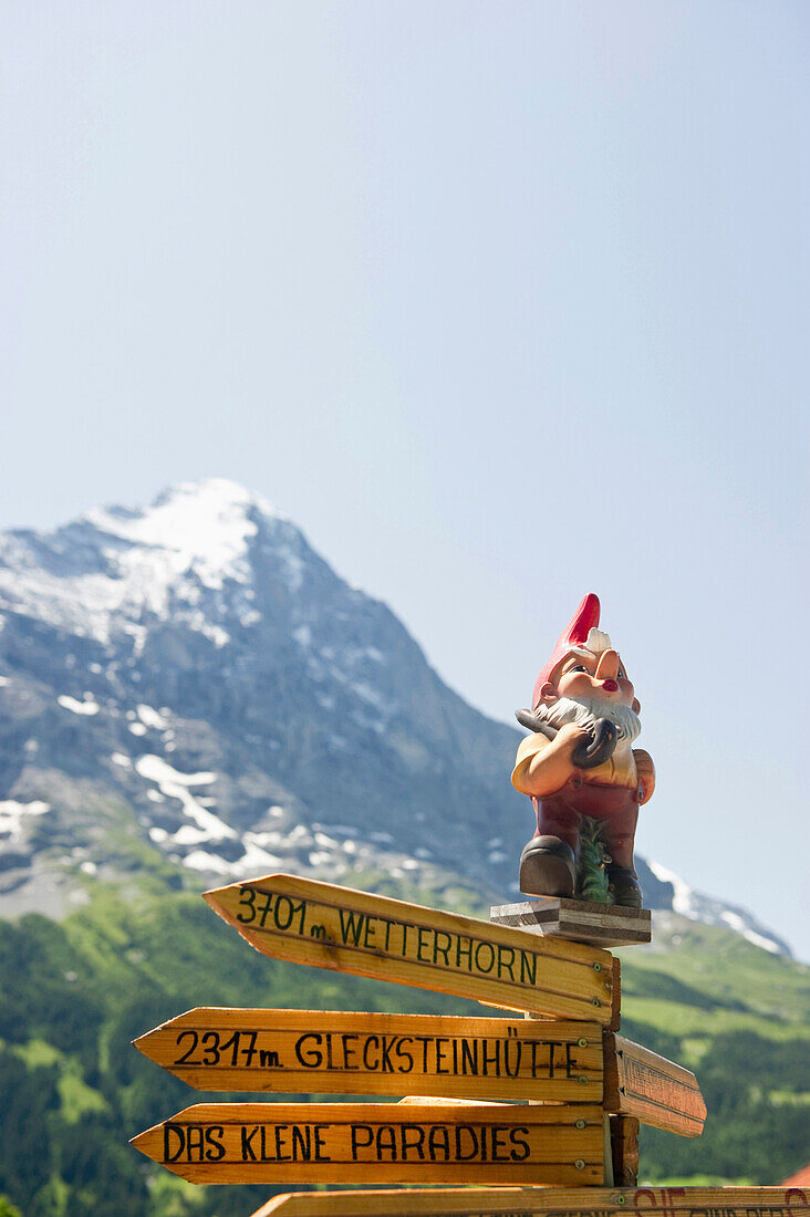 Signpost in front of Mount Eiger, Grindelwald, canton of Bern, Switzerland, Europe