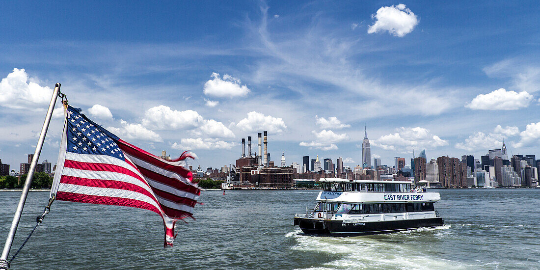 East River Ferry with American Flag, View to Midtown Manhattan, New York City, New York, USA