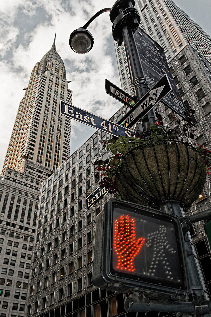 Red traffic light in front of the Chrysler building, vertical, New York City, New York, USA