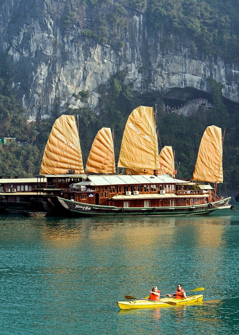 Sea kayaking near the rocky islands of Halong Bay Vietnam