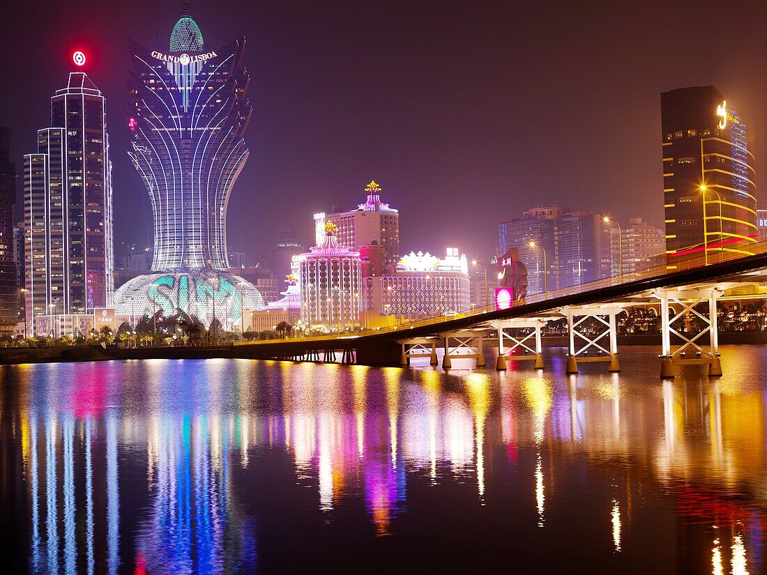In the foreground is the Governor Nobre de Carvalho Bridge, also know as the Macau-Taipa Bridge, conecting Taipa Island to Macau, seen in the background with all its extravagant casino´s and hotels