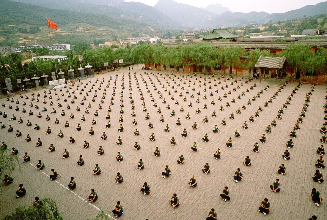 Kung fu students practice synchronized kung fu at the Ta Gou academy in Henan Province, Shaolin