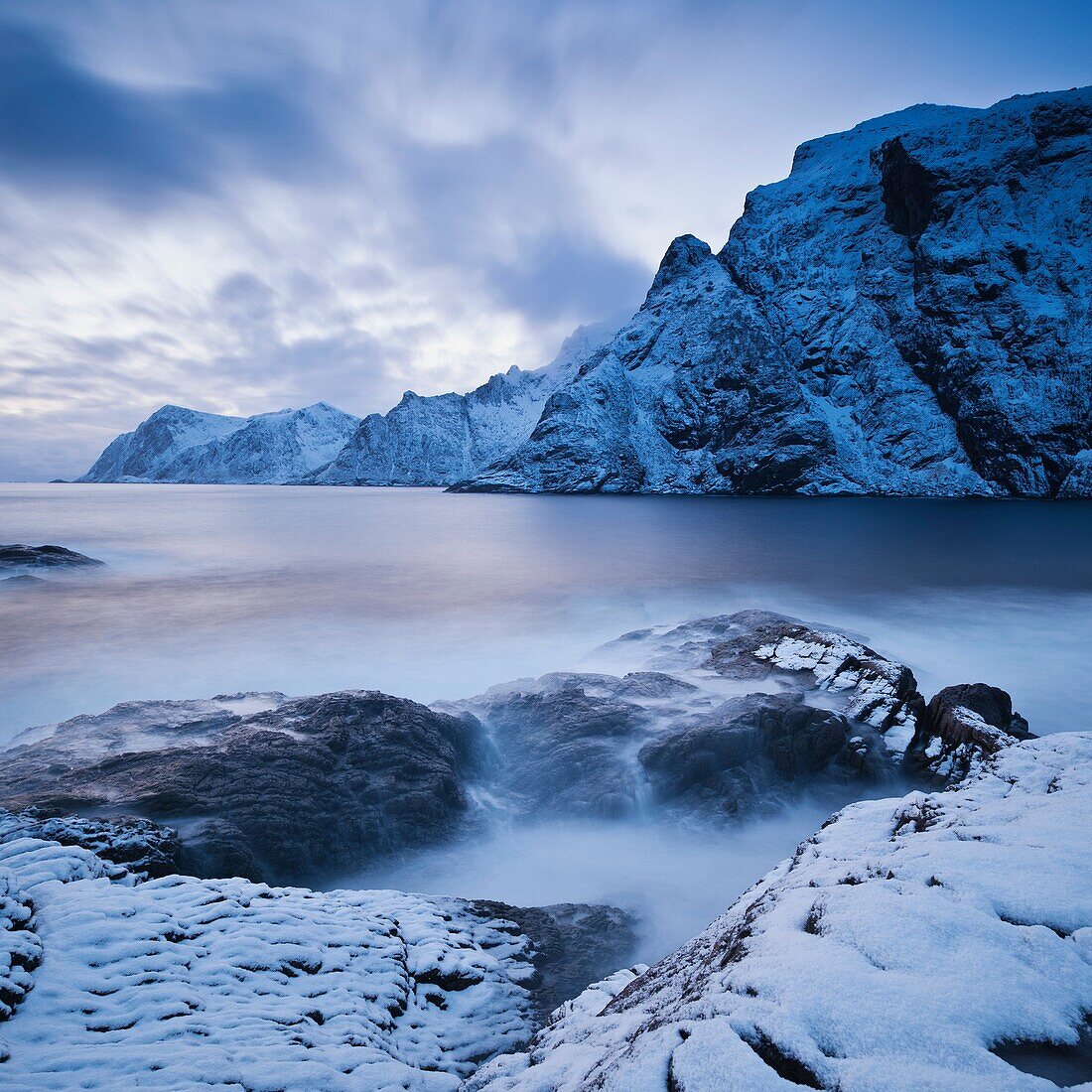 Dramatic scenery at snow covered coastline, Å I Lofoten, Lofoten Islands, Norway
