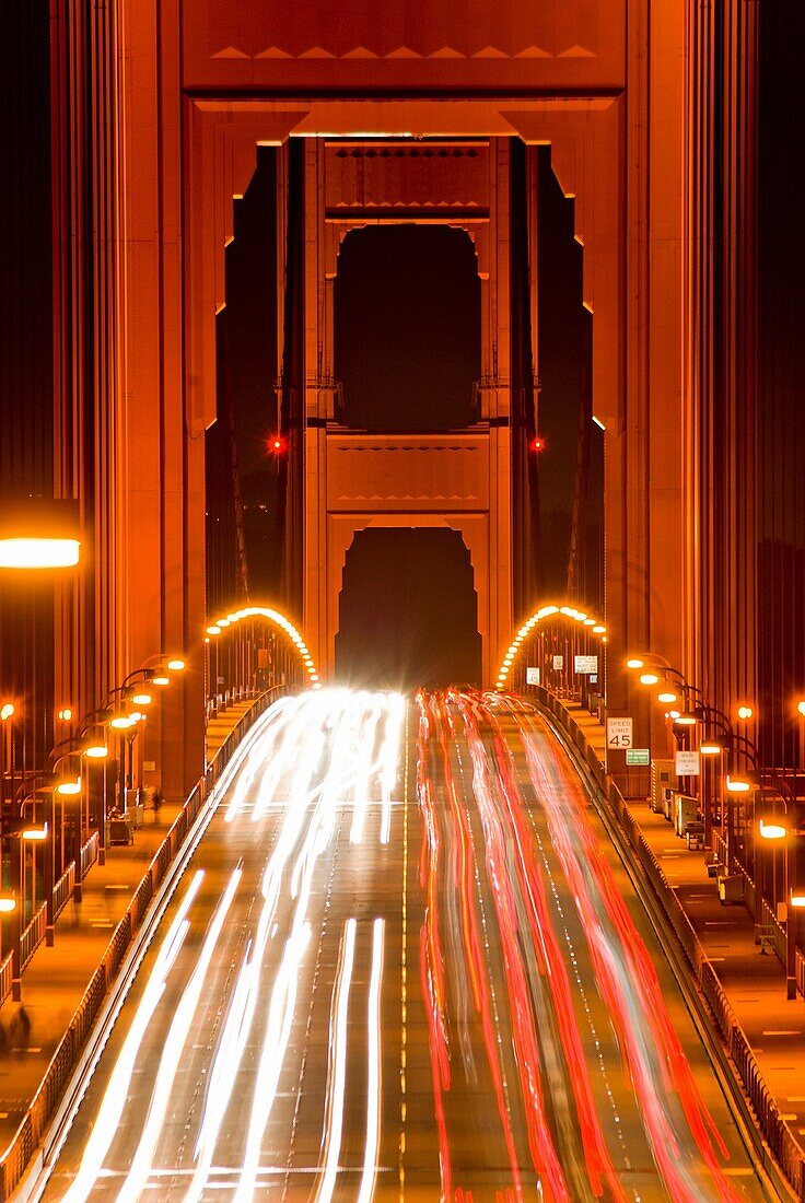 the Golden Gate Bridge traffic at night, San Francisco, California, USA