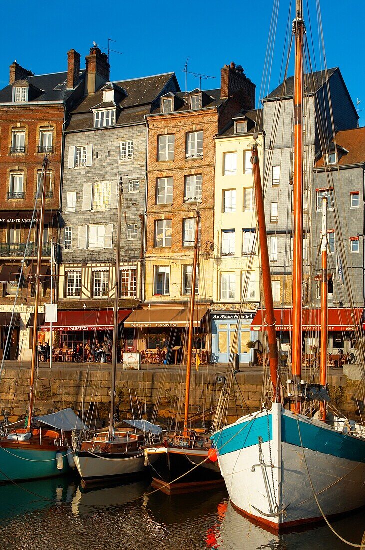 harbour scene with yaughts and harbour restaurants  Honfleur, Normandy, France