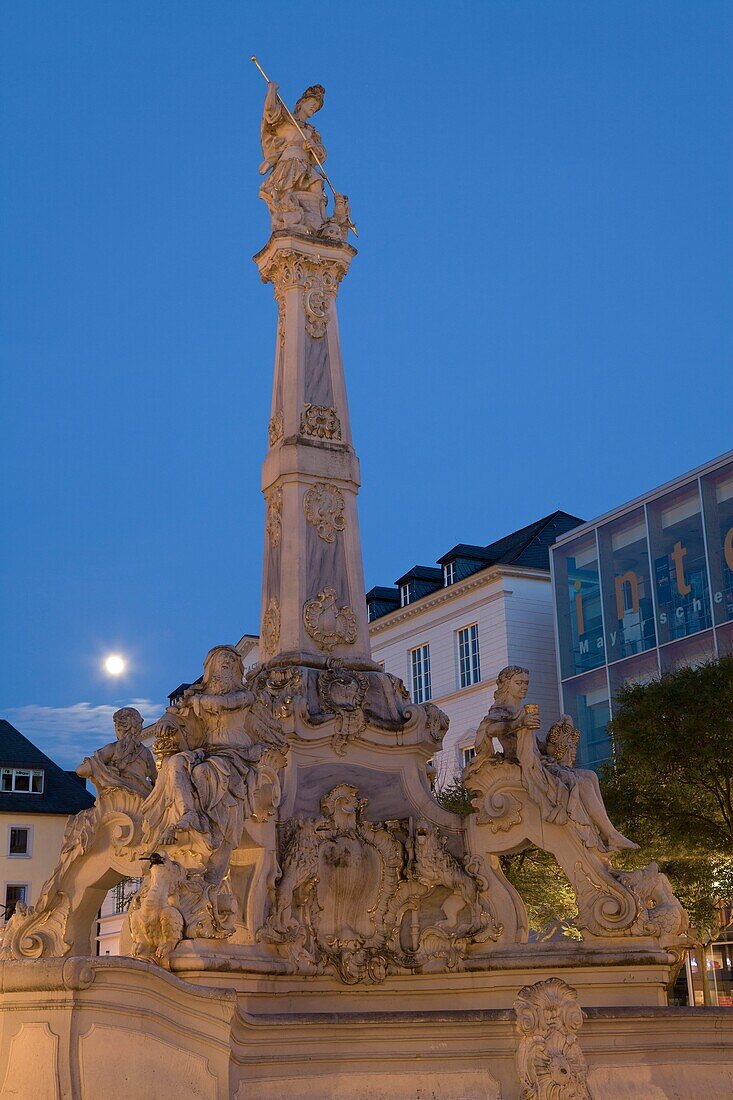 St Georg´s fountain, illuminated at night, Trier, Germany