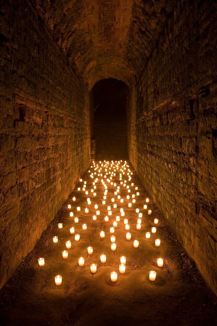 subway of the Kaiserthermen, illuminated with candles, Trier, Germany