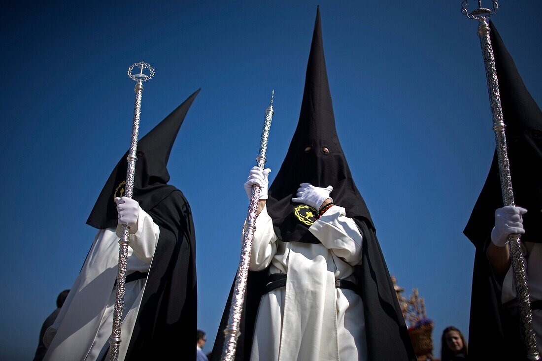 Penitents of the Jesus del Silencio brotherhood, known as the Brotherhood of Love perform in an Easter Holy Week procession in Cordoba, Andalusia, Spain, April 17, 2011