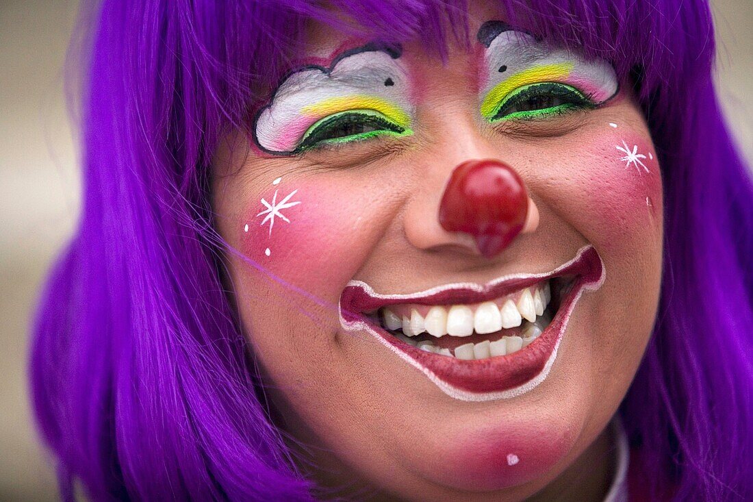A female clown smiles during the 16th International Clown Convention: The Laughter Fair organized by the Latino Clown Brotherhood, in Mexico City, October 17, 2011