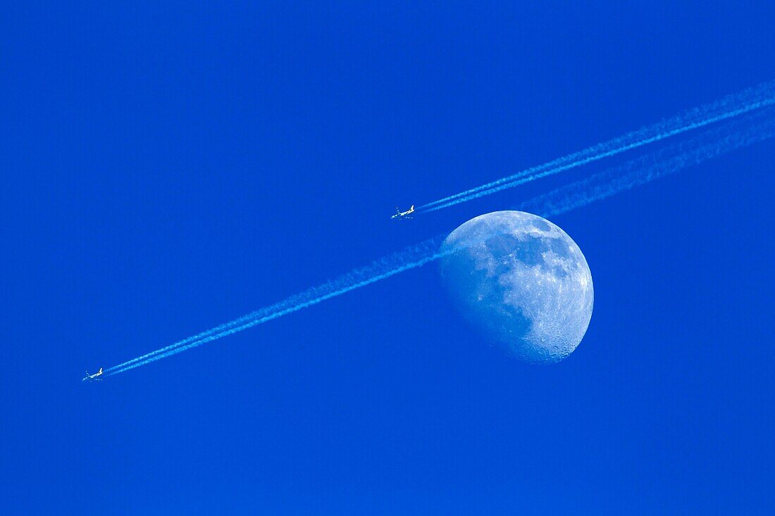 two plane fly close the moon
