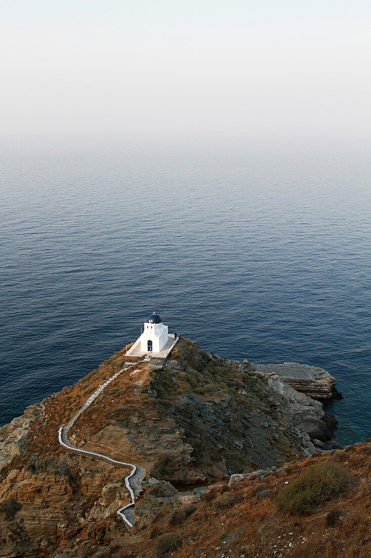 Europe, Greece, Cyclades, Sifnos island, Kastro village, chapel of Epta Martyrès overhanging the Aegean Sea