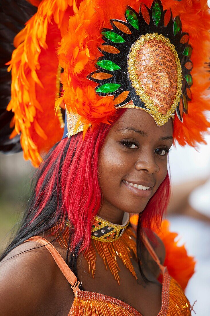 A parade participant in festive attire at the West Indian American Day Parade held on Monday, September 5, 2011 in Crown Heights, Brooklyn, New York. A parade participant in festive attire at the West Indian American Day Parade held on Monday, September 5