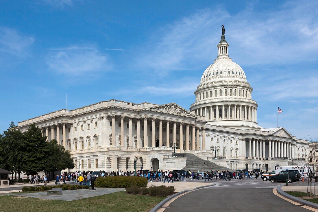 Visitors head for the southeast entrance to the US Capitol Building in Washington DC, USA