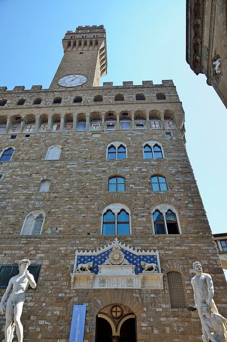 Palazzo Vecchio with statues of Michelangelo´s David left and Hercules and Cacus right, Florence, Tuscany, Italy