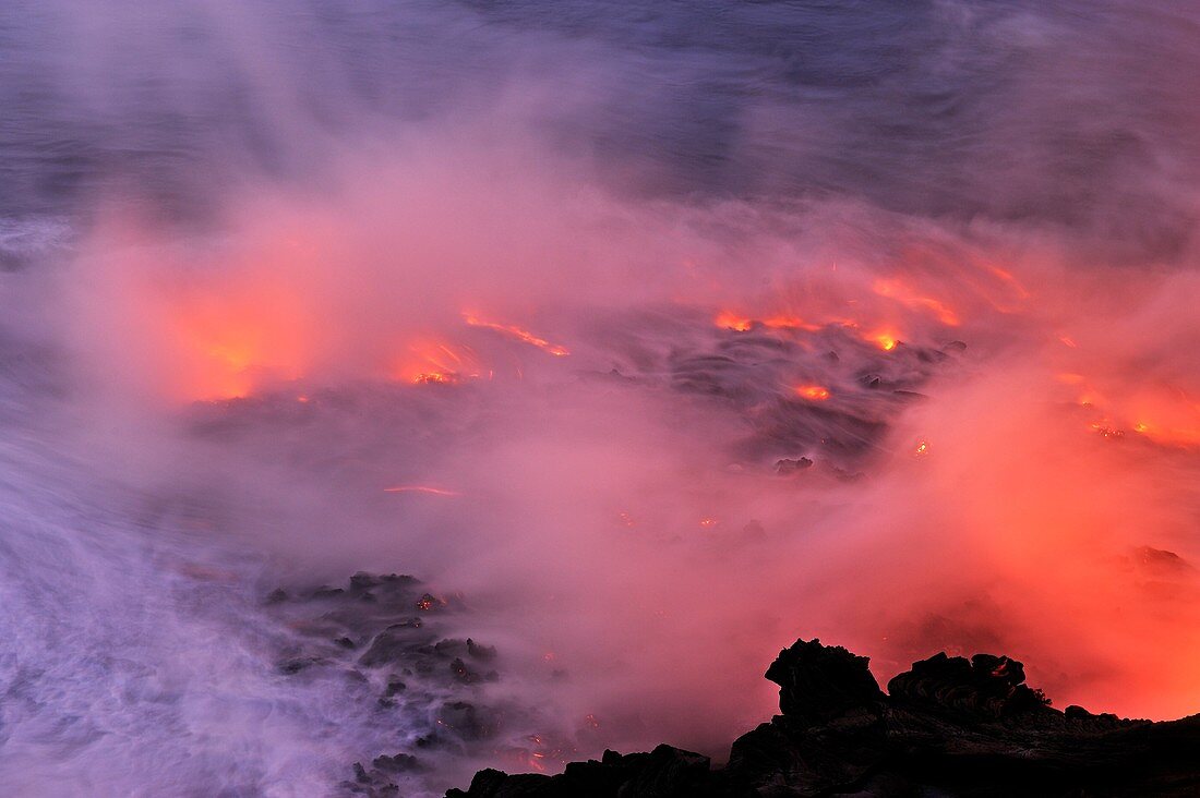 Steam rising off lava flowing into ocean, Kilauea Volcano, Big Island, Hawaii Islands, Usa