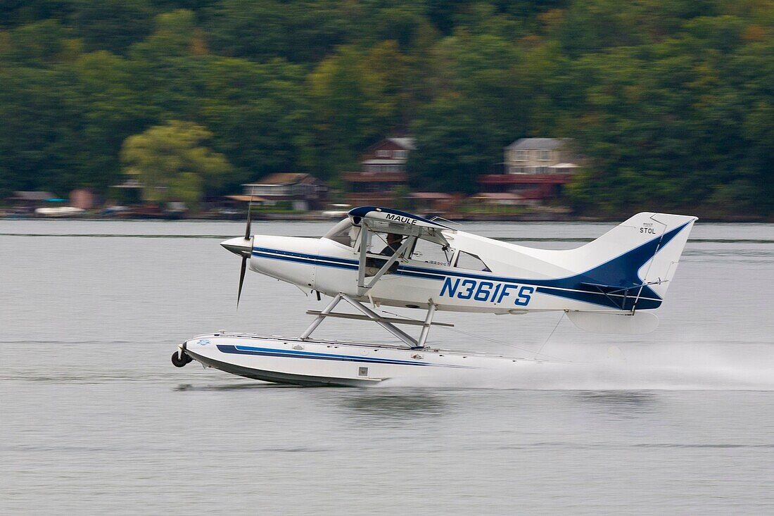 Seaplane landing on Keuka Lake at Hammondsport New York Seaplane Homecoming sponsored by the Glenn Curtis Museum