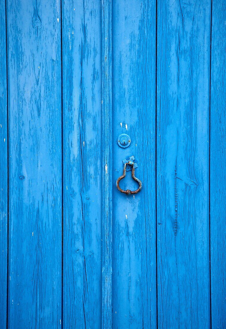 Closeup Details of a Blue Wood Rustic Wood Door of the Medieval Village of Obidos