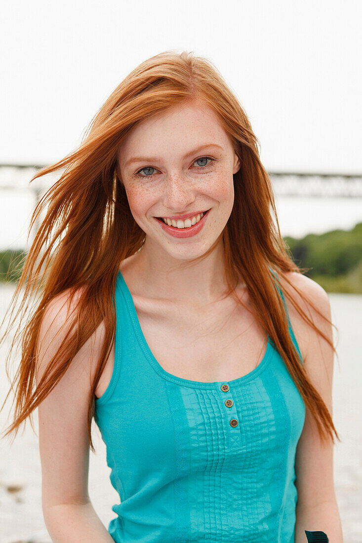 Young woman smiling at camera, Munich, Bavaria, Germany