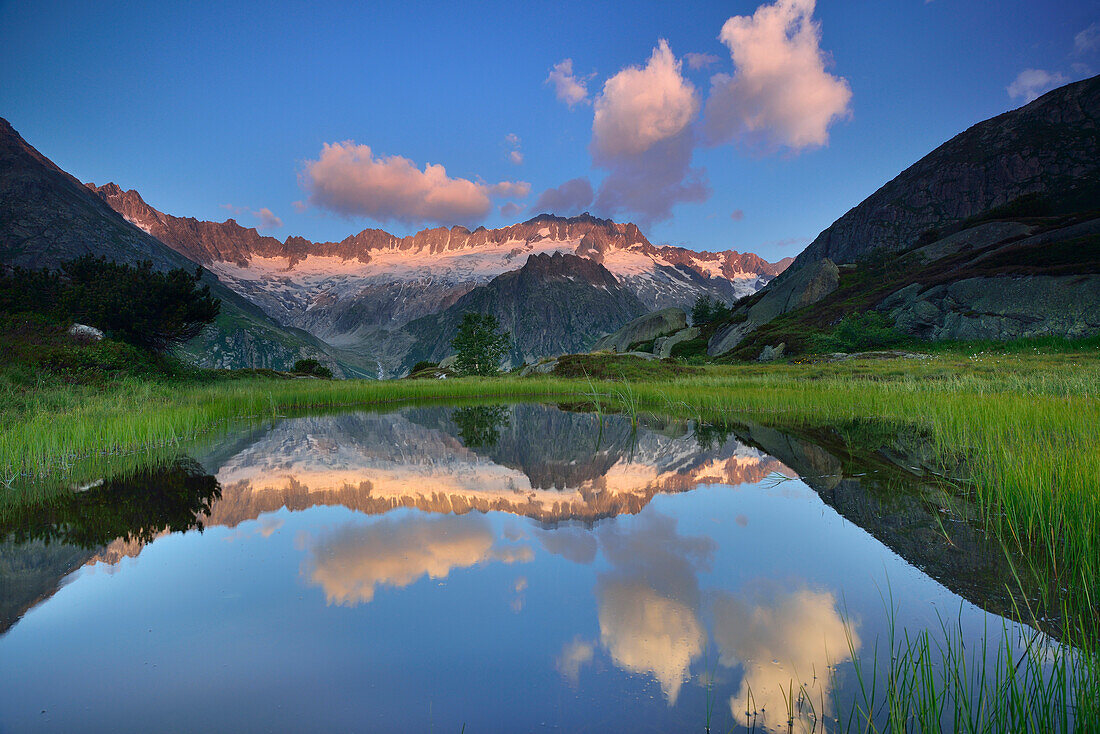 Dammastock reflecting in a mountain lake, Dammastock, Urner Alps, Uri, Switzerland