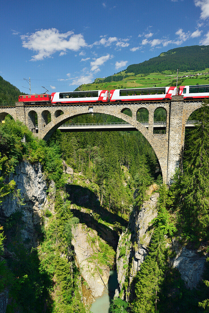 Rhaetian Railway driving over Solis Viaduct, Solis-Viaduct, Rhaetian Railway, Albulabahn, UNESCO World Heritage Site Rhaetian Railway, Grisons, Switzerland