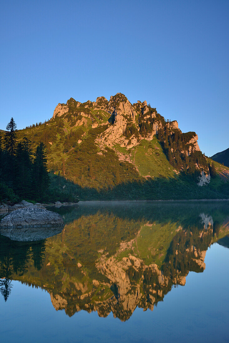 Ruchenkoepfe reflecting in mountain lake, Spitzing area, Bavarian Alps, Upper Bavaria, Bavaria, Germany