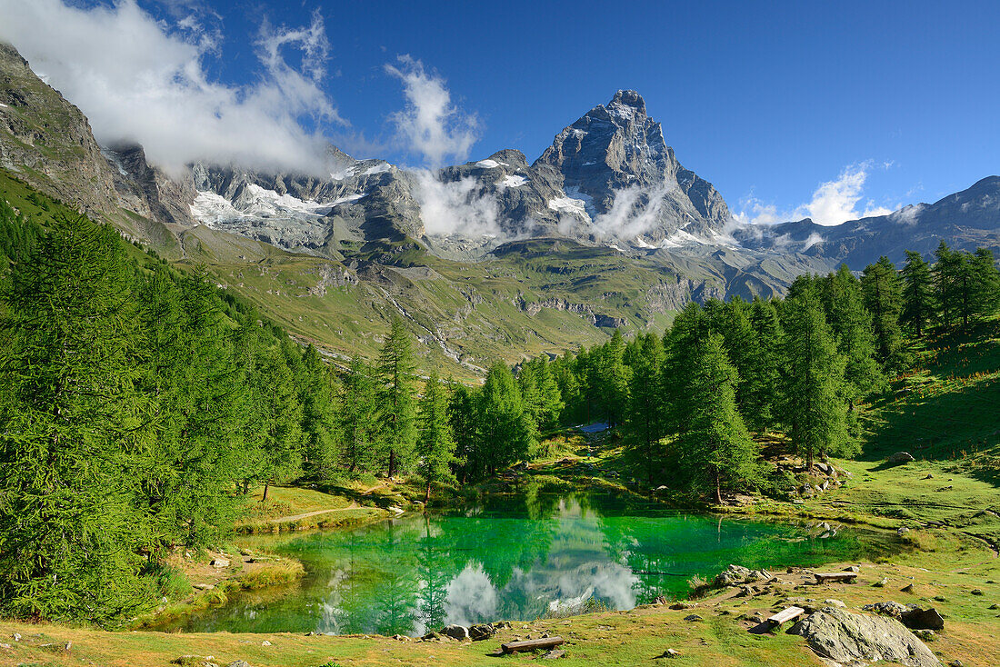 Matterhorn reflecting in a mountain lake, Cervinia, Breuil, Pennine Alps, Aosta valley, Italy