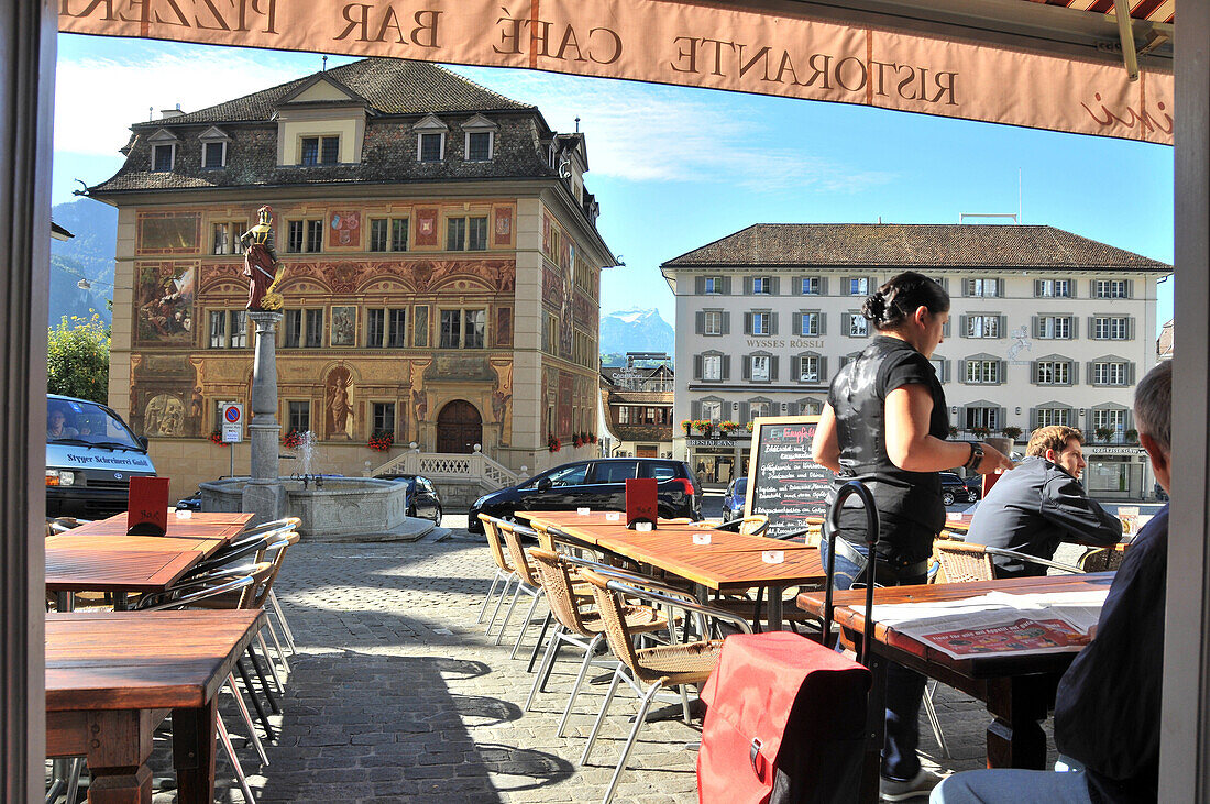 Cafe at the market place and townhall of Schwyz, Canton Schwyz, Centralswitzerland, Switzerland, Europe