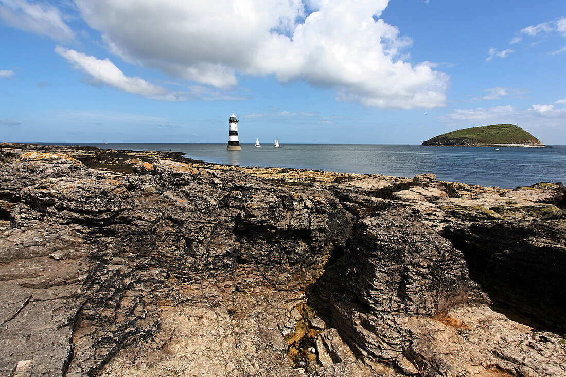 The Penmon Lighthouse and Puffin Island northwest of the island of Angesey, North Wales, Great Britain, Europe