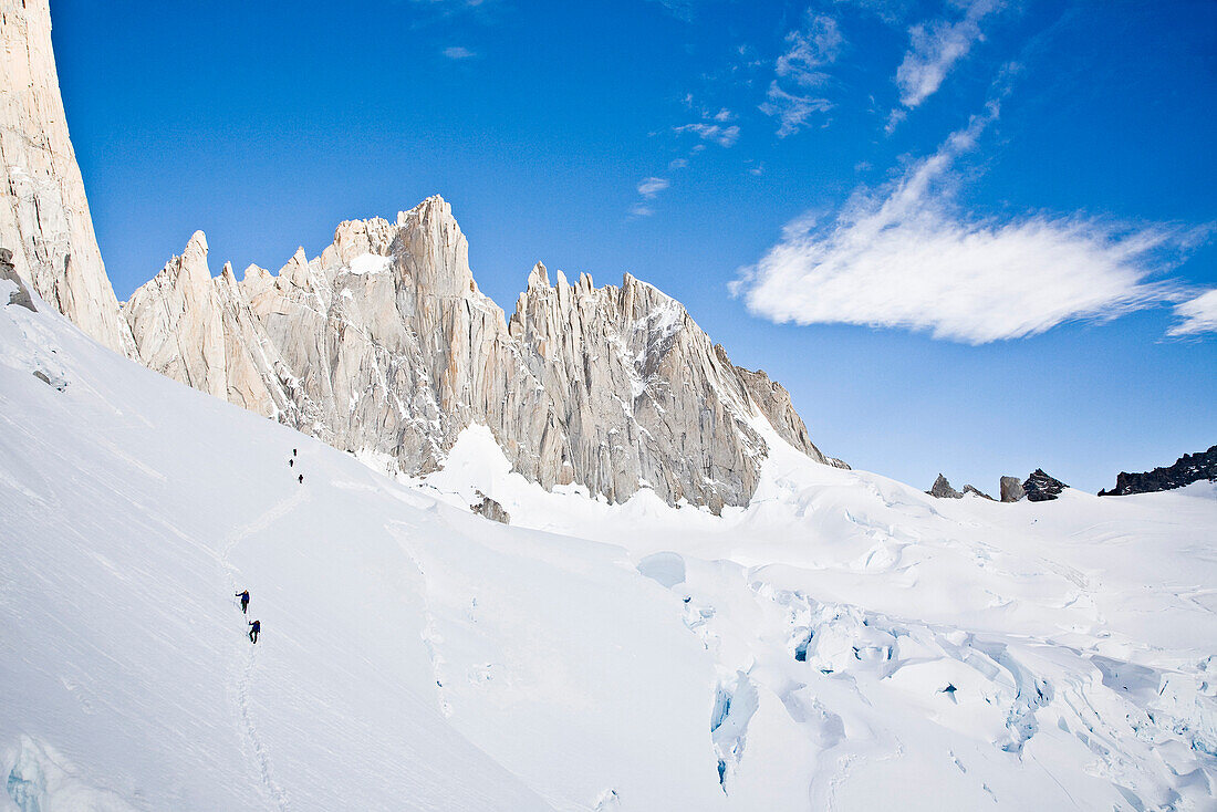 Climbers ascending to the high camp Passo Superior, Fitz Roy Massif, El Chalten, Patagonia, Argentina