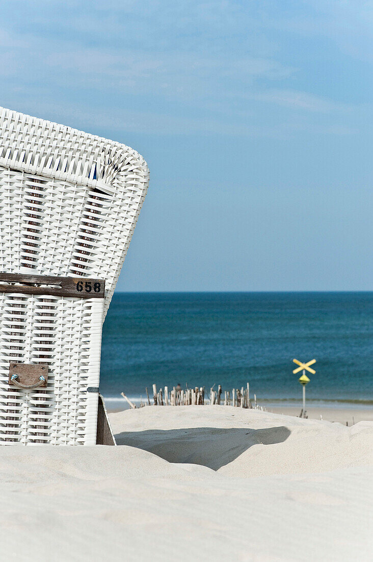 Hooded beach chair on the beach, Sylt, Schleswig-Holstein, Germany