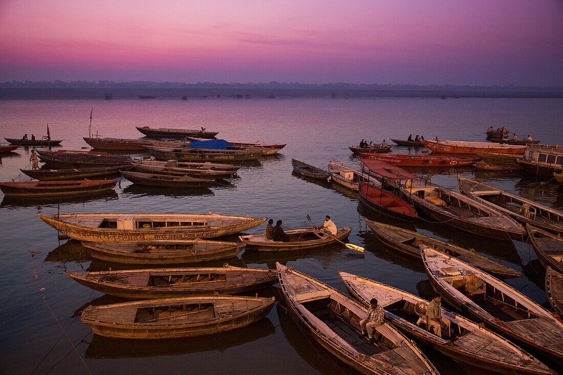 Boats on Ganges river in front of Dasaswamedh Ghat at dawn, Varanasi, Uttar Pradesh, India