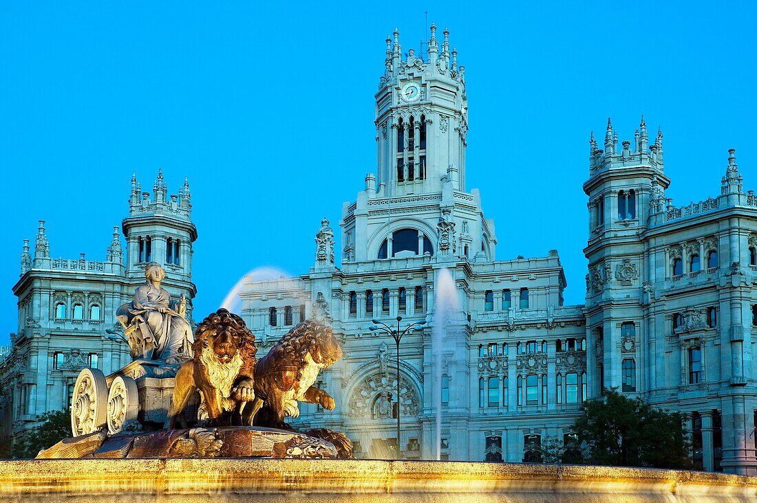 La Cibeles Fountain, Plaza de Cibeles, and The City Hall building, Madrid, Spain.
