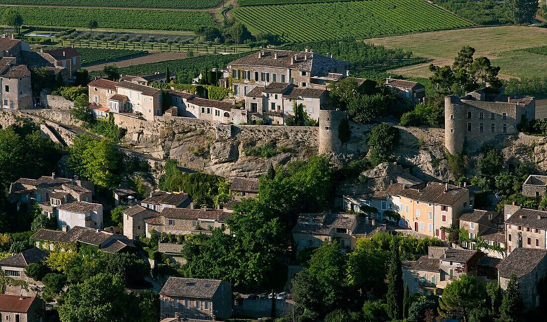 France, Vaucluse, (84), Ménerbes village perched at the foot of the Luberon, village labeled The Most Beautiful Villages of France (aerial photo)