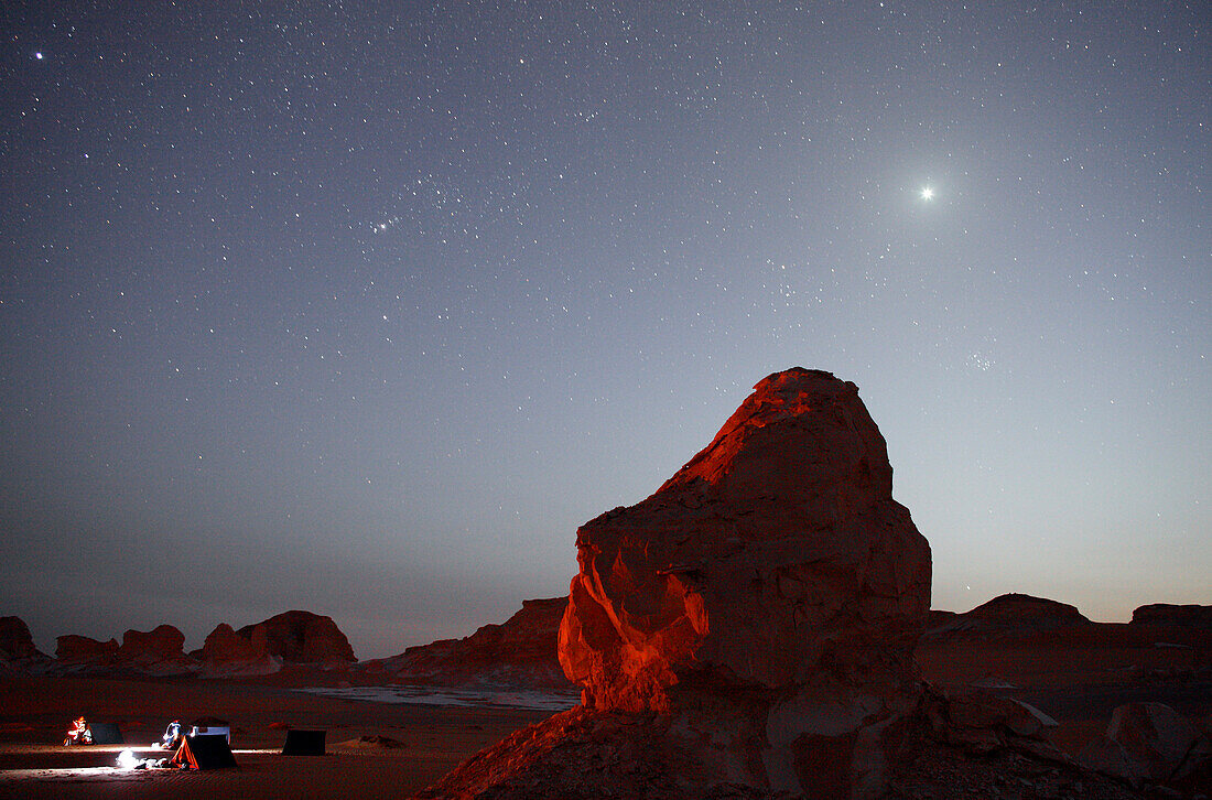 Egypt, limestone rocks at night in the desert with campers