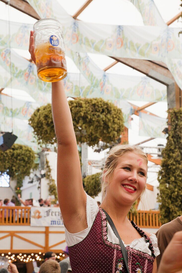 Germany,Baveria,Munich,Oktoberfest,Girl Partying in Beer Tent