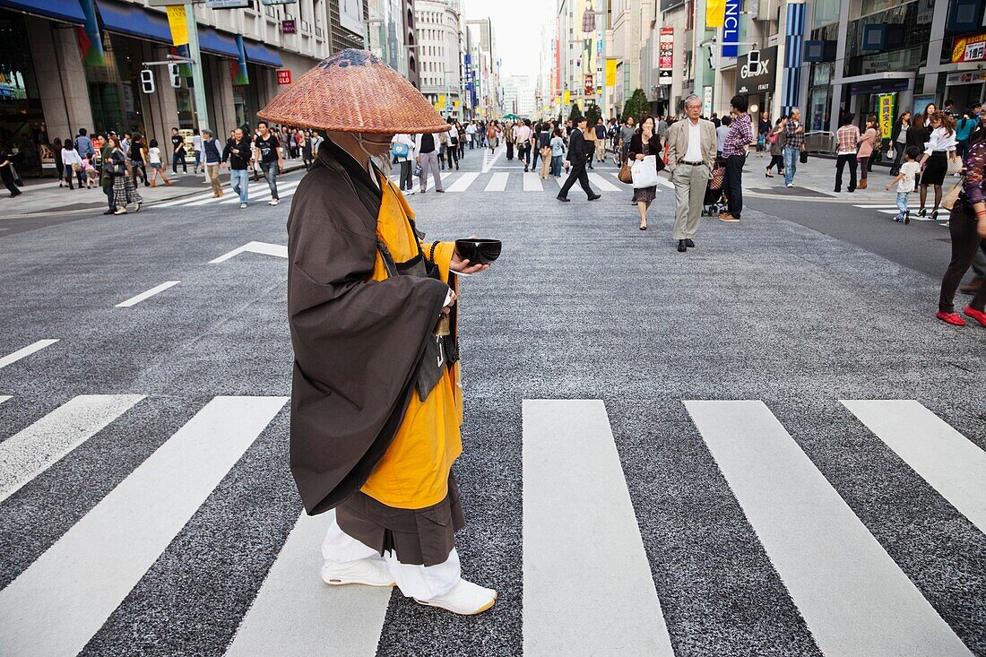 Japan,Tokyo,Ginza,Monk Collecting Alms
