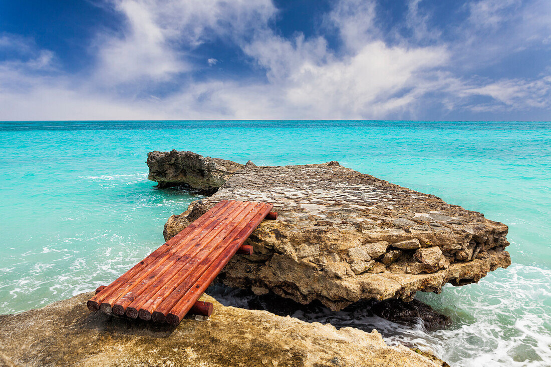 Wooden bridge across rocks in the carribean, Cancun, Yucatan Peninsula, Quintana Roo, Mexico