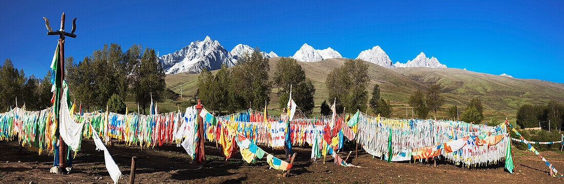 Repotacha, a Meditation Retreat, and Buddhist sacred place. Road between Ganzi and Manigango lined with prayer flags.