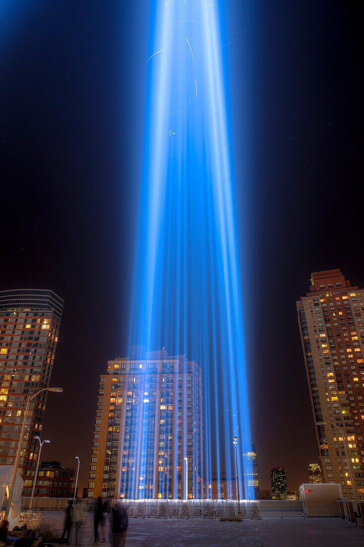 One of the beams of light of the Tribute in Light, an annual memorial to the events of September 11, 2001, shines into the night sky in New York City on Tuesday, September 11, 2012 from the installation on the roof of the Battery Parking Garage on West St