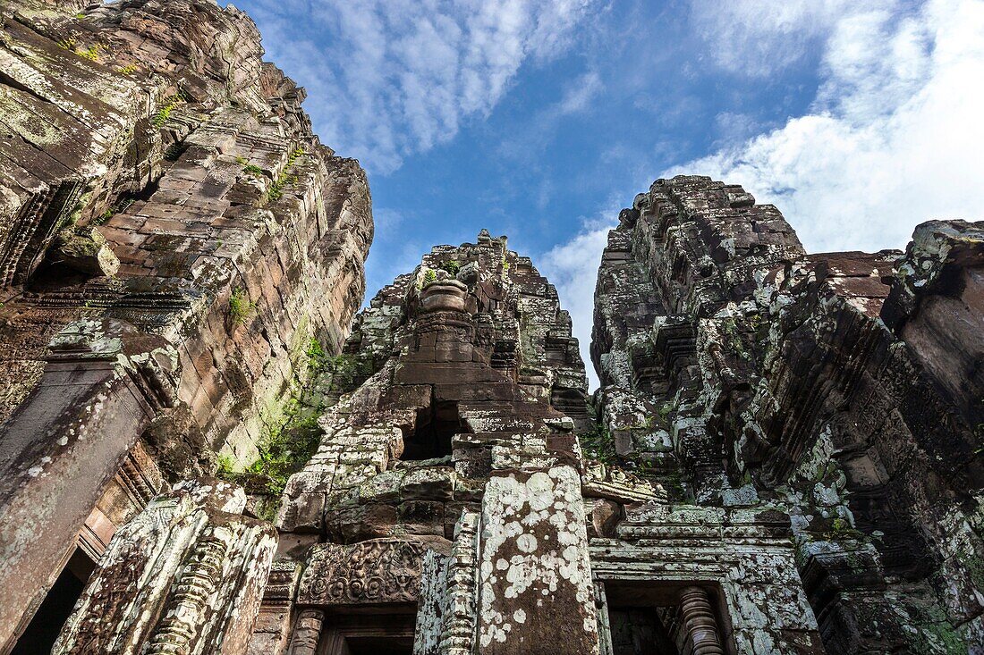 The Bayon Khmer: Prasat Bayon is a well-known and richly decorated Khmer temple at Angkor in Cambodia, Built in the late 12th century or early 13th century as the official state temple of the Mahayana Buddhist King Jayavarman VII, the Bayon stands at th