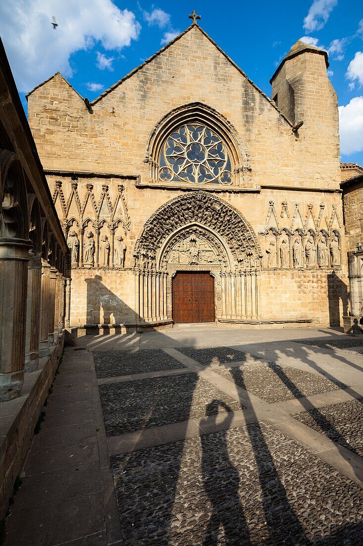 Church of St. Mary in Olite at evening with shadow of photographer, Navarre, Spain