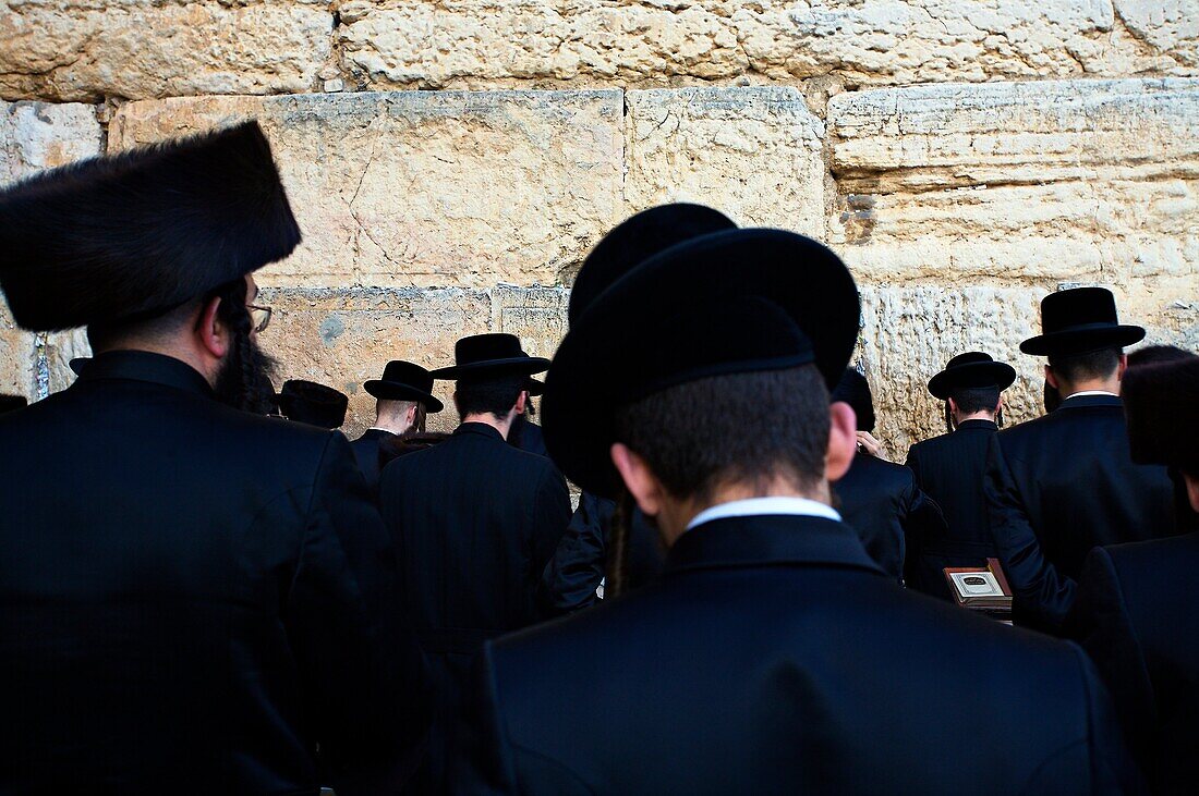 Orthodox Jews praying by the Wailing Wall ´Western Wall´ , Jerusalem  Israel.