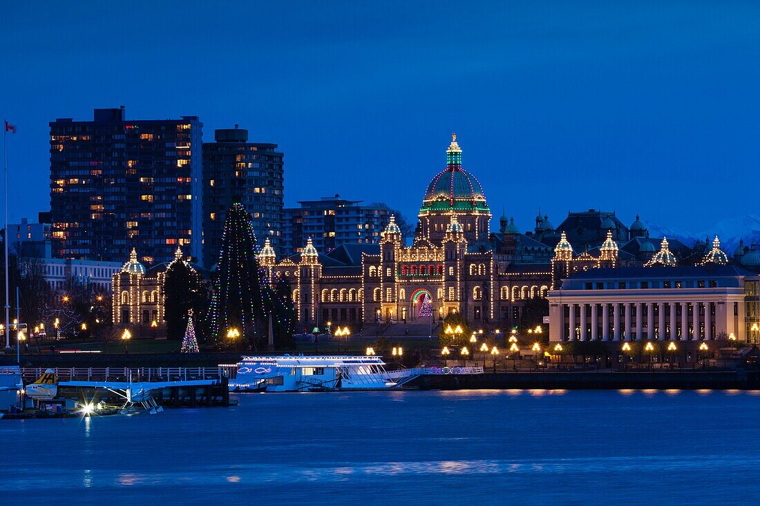 Canada, British Columbia, Vancouver Island, Victoria, Inner Harbour view towards the British Columbia Parliament Building, dusk