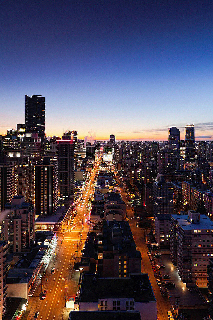 Canada, British Columbia, Vancouver, elevated view West End buildings along Robson Street, dawn